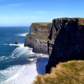 cliffs of moher, high cliffs against blue sea and sky, irelands west coast blog image