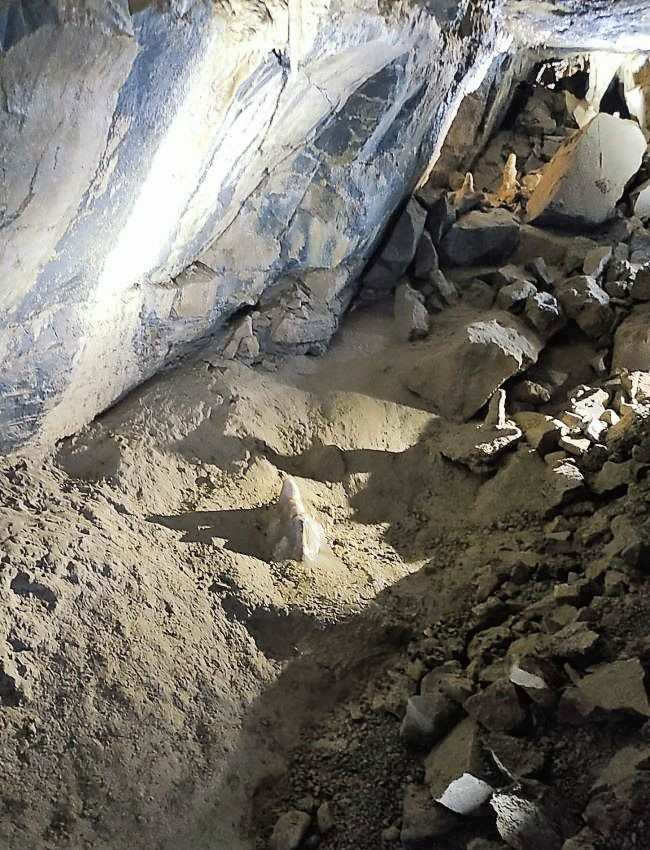 Aillwee Cave interior detail of a ridge filled with rock sand