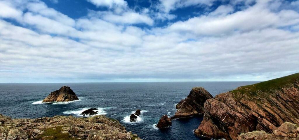 Erris Head Loop Walk View over the sea at Llandavuck Island and pigeon rock