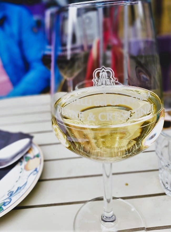 Glass of white wine on a dining table