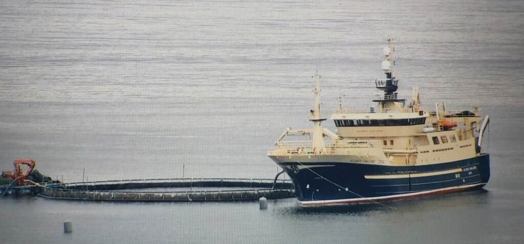 Boat moored in the sea off Clare Island in County Mayo