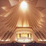 A view from the back seats across the empty Auditorio de Tenerife by Santiago Calatrava, view of the stage and walls with ceiling